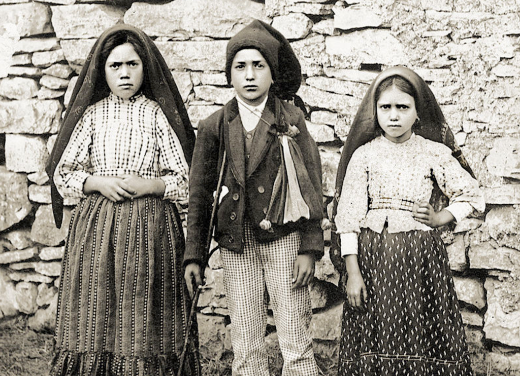 Lucia,  Jacinta y Francisco Marto 